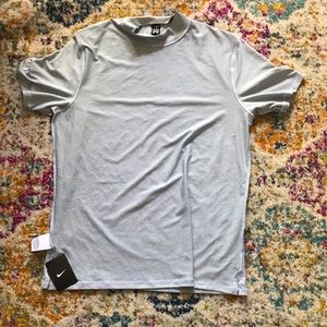 White and grey striped Nike shirt, brand new.